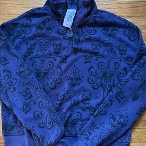 Never worn! NWOT! Women’s Haunted Mansion Purple and Black half zip sweatshirt.